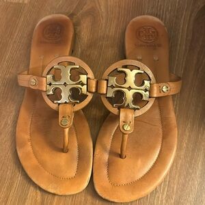Tory Burch sandals. It’s been worn but in good condition.